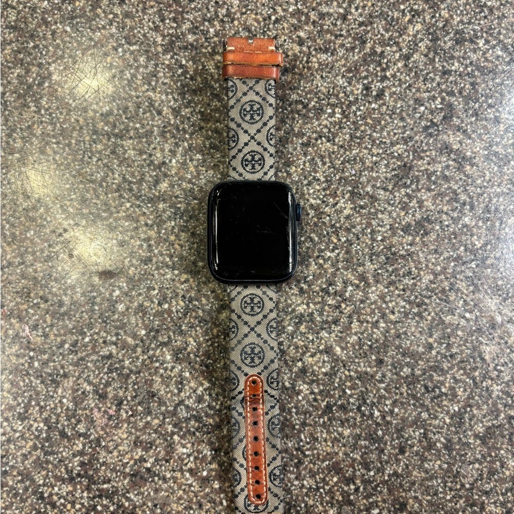 Apple Watch with Tory Burch band plus charger 
SERIES 6
